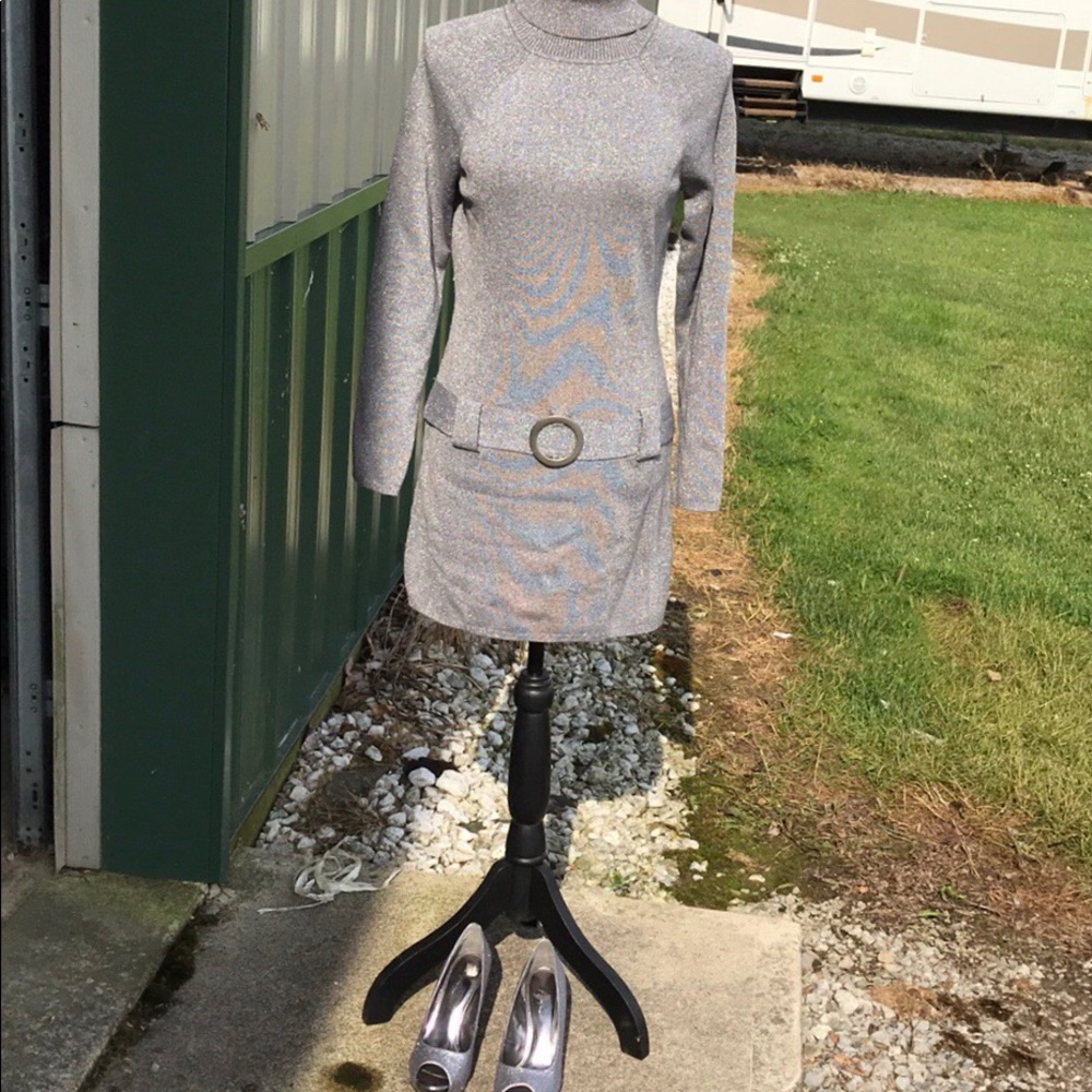 Silver metallic mini long sleeve runs small.